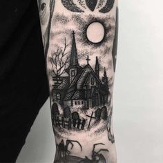 a person with a tattoo on their arm and the image of a church in the background