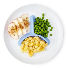 a white plate topped with macaroni and peas