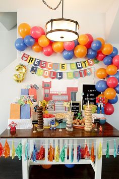 a birthday party with balloons and decorations