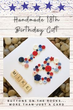 a birthday card with buttons on the rocks and words made to look like an american flag