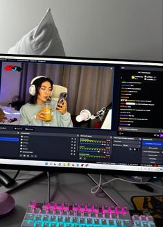 a computer monitor sitting on top of a desk next to a keyboard and mouses