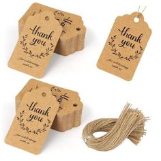 thank you tags and twine with the words thank you written on them, set of four