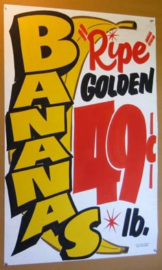 a sign that says ripe golden bananas on it