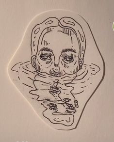 a drawing of a woman's face in water