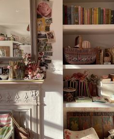 there are many books on the shelves in this room and one is filled with pictures