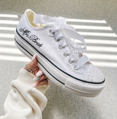 Brand new with box  Bridal converse low top platform sneakers with white pearls  Satin laces are extra cost, if you want satin laces please order from the below link https://www.etsy.com/listing/1495379185/chiffon-shoe-laces?click_key=10ad690d6c69158d290a6fd082f389e294514714%3A1495379185&click_sum=7320c56b&ref=shop_home_active_30&pro=1&frs=1&sts=1 Wedding Sneakers Converse, Matching Converse Wedding, White Wedding Sneakers Women, Reception Sneakers For Bride, Sneakers For Wedding Brides, Wedding Sneakers For Bride Converse, Wedding Converse Bride And Groom, Diy Wedding Sneakers, Wedding Reception Shoes For Bride