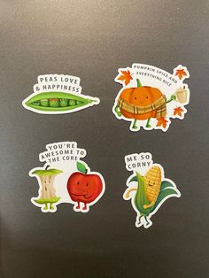 stickers on the side of a refrigerator that says peas, carrots, and happiness