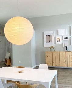 a white table and chairs in a room