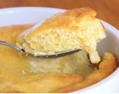 a casserole dish with a spoon in it