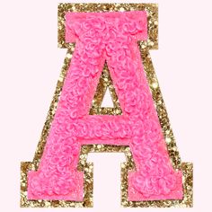 the letters are made out of pink and gold glitters