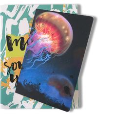 two notebooks with an image of jellyfish on them