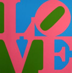 a painting with the word love painted in green, pink and blue on top of it