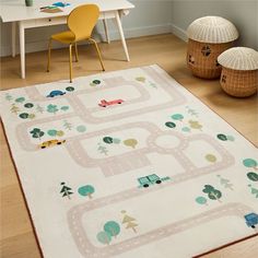 a child's rug with cars and trees on it