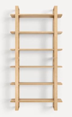 a wooden shelf with several shelves on each side and one section missing from the wall