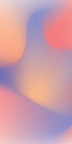 an abstract blurry background with pink and blue colors