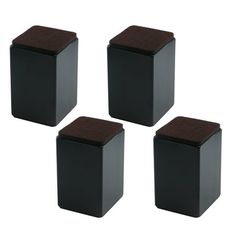 four black square boxes with brown lids