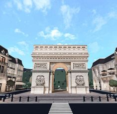 an arch in the middle of a street with buildings around it and trees on both sides