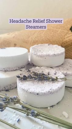 soaps and lavender flowers on a table