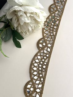 This Indian mirror embellished border beautifully crafted Indian mirror belt is very pretty for kaftans, mirror belts, embellished necks, saree trims, lehngas, sari borders, dupatta trims. Let your creativity flow and enhance your outfit :    Experience the magic of our geometric mirror  Trim, a true game-changer when it comes to adding a touch of glamour to your outfits. Picture shining mirror work in dazzling gold, masterfully crafted in a cutwork design, elevating your style to the next level Indian Mirror Work, Mirror Work Border, Mirror Belt, Indian Mirror, Suit Neck, Sarees Blouse, Geometric Mirror, Mirror Trim, Saree Border