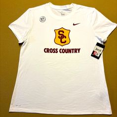 Brand New With Tags. Show Your Trojan Pride With This Officially Licensed Usc Women's Cross Country T-Shirt In Size Xl. The White Shirt Features Nike Branding And Is Perfect For Any Fan Of Usc Athletics. Ideal For Cross Country Sport Enthusiasts And To Wear To Games, This Shirt Is A Must-Have For Any Usc Fan. The Shirt Is Designed For Women And Is Made From High-Quality Materials. Show Off Your Support For The Usc Trojans With This Stylish And Comfortable Shirt. Tee Shirt, Short Sleeve, Short Sl Cross Country Tshirts, Neon Yellow Tops, Baseball Tops, Nike Branding, Womens Black Shorts, Surf Shirt, Usc Trojans, Dri Fit Shirt, White Crew Neck