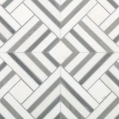 a white and gray tiled floor with grey lines