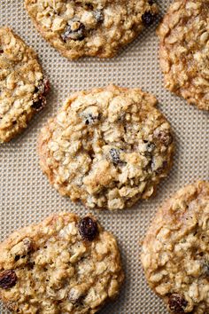 several oatmeal cookies on a baking sheet