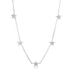 Beautiful, dainty, minimal and super sparkly celestial pave star choker necklace. This necklace features 5 tiny crystal stars on a sterling silver chain. Has a 3 inch extender so it can also be worn as a layering necklace. Available in Gold and Silver. Metals: 14k Gold Vermeil, Sterling Silver Gemstone: Cubic Zirconia Necklace Length: 14” + 3” chain extender Star Choker, Star Necklace Silver, Zirconia Necklace, Cubic Zirconia Necklace, Tiny Diamond, Crystal Stars, Chain Extenders, Layering Necklace, Diamond Crystal