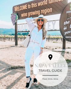 a woman standing in front of a sign that says nap valley