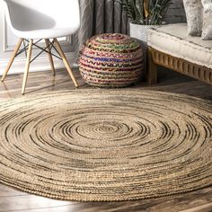 a round rug in the middle of a living room