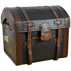 an old - fashioned leather trunk with straps and buckles is displayed on a white background