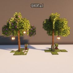 three small trees with lights in them