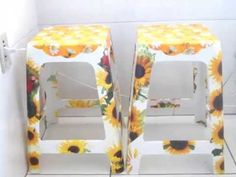 two sunflowers are painted on the side of these stools