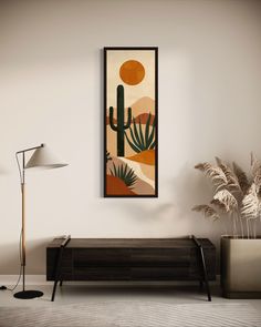 a painting hanging on the wall above a couch in a living room with a lamp