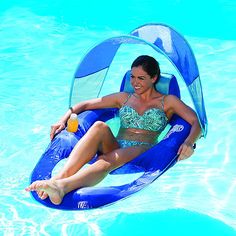 a woman sitting on an inflatable pool float