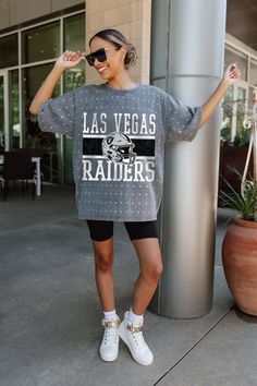 Make a statement in any crowd with our Las Vegas Raiders oversized fit, all-over mini rhinestone short sleeve tee featuring a ribbed neckline. Embrace the sparkle while staying comfortable—perfect for every dedicated fan. Raiders Shirt, Womens Outfit, Las Vegas Raiders, Football Outfits, Ribbed Neckline, Oversized Fits, Short Sleeve Tee, Las Vegas, Womens Shirts