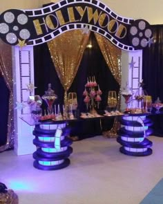 a hollywood themed dessert table at a party