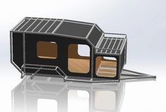 an image of a tiny house that is made out of cardboard