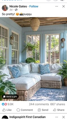 an instagramted photo of a living room with blue walls and white wicker furniture