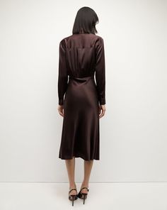 With a wrap-style top and a bias-cut skirt, the Otis is a chic wardrobe hero that takes the guesswork out of getting dressed. Cut from fluid stretch silk, this effortless dress is great for work and can easily be dressed up for night. 53% Silk, 35% Viscose, 12% ElastaneUnlinedDry clean onlyStyle #2409FL5021197 Elegant Satin Wrap Dress For Work, Sleek Long Sleeve Silk Midi Dress, Elegant Fitted Viscose Wrap Dress, Chic Semi-formal Viscose Dress, Fitted Viscose Silk Dress For Workwear, Fitted Viscose Dress For Work, Silk V-neck Wrap Dress For Date Night, Chic Long Sleeve Bias Cut Midi Dress, Elegant Viscose Midi Wrap Dress