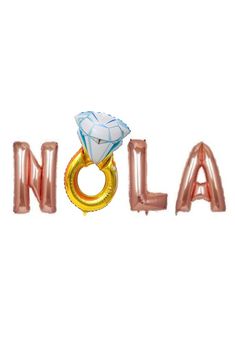 the word nola spelled with balloons in gold and silver letters on a white background