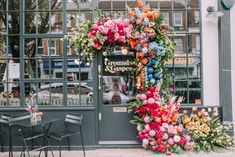 an instagram with flowers on the front door