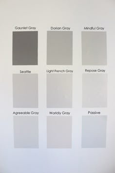 several shades of gray paint on a white wall