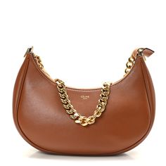 This is an authentic CELINE Smooth Calfskin Medium Chain Strap Ava Shoulder Bag in Tan. This chic bag is crafted of brown leather. The bag features a gold chain shoulder strap and gold hardware. The top zipper opens to a brown suede interior with a patch pocket. Celine Box, Chic Bags, Bag Light, Black Cross Body Bag, Flap Bag, White Bag, Brown Suede, Chain Strap, Belt Bag