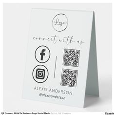 a white business card with qr code and social media icons on the front side