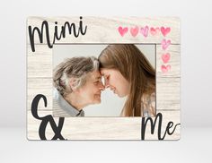 a wooden frame with an image of two people and hearts on the front, saying'i love you & me '