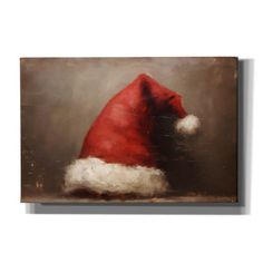 a painting of a santa hat on a wall