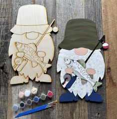 some wood cut outs are laying out on a table