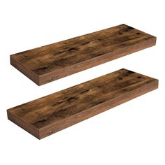 two pieces of wood sitting on top of each other