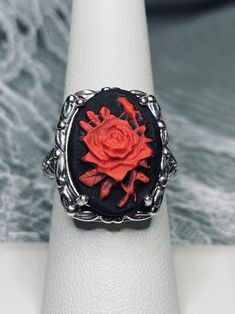 Red & Black Rose Cameo Ring Leaf Accent Design#120 Made To Order  This is a brand new Art Nouveau inspired solid sterling silver filigree ring. The high quality black & Red rose flower cameo is 18mm by 13mm. The inside of the band is marked 925 for sterling. There is delicate leaf detail surrounding the Cameo.  The swirl of the filigree lifts and highlights the beauty of this vintage ring.  Enjoy the old world beauty of this classic style.   Suggested Retail $229+ *Custom Made to Order Handling Black Red Rose, Rose Leaf, Antique Filigree, Red Rose Flower, Filigree Jewelry, Rose Leaves, Cameo Ring, Rose Rouge, Sterling Silver Filigree