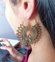 Gold Brass Earrings, Mandala Earrings, Hoop Earrings, Bohemian Earrings, Handmade Earrings, Mothers Day Gift, Minimalist Jewelry 1. Please share your numbers (in personalization box ) as required for shipping address details, and it'll help us to contact you easily. And don't worry about the privacy, we'll keep it safe with us, So try to cooperate with us. :) 2.Customers' satisfaction is our biggest priority, please contact us with any questions/queries for future or existing orders, and we will do our best to make sure you are happy with your order. 3.Please make sure to add the correct address during checkout. You can return your purchased item within 15 days after successful delivery. We offer a 100% "Money Back Guarantee" if you are not satisfied with your purchase. Return charges will Bohemian Single Wrap Drop Earring, Bohemian Dangle Wrap Earrings For Pierced Ears, Bohemian Dangle Wrap Earrings, Single Wrap Earring For Festivals, Bohemian Metal Wrap Earrings, Bohemian Metal Wrap Earrings With Ear Wire, Single Round Earring For Festival, Gold Bohemian Wrap Earrings For Festivals, Bohemian Gold Wrap Earrings For Festival